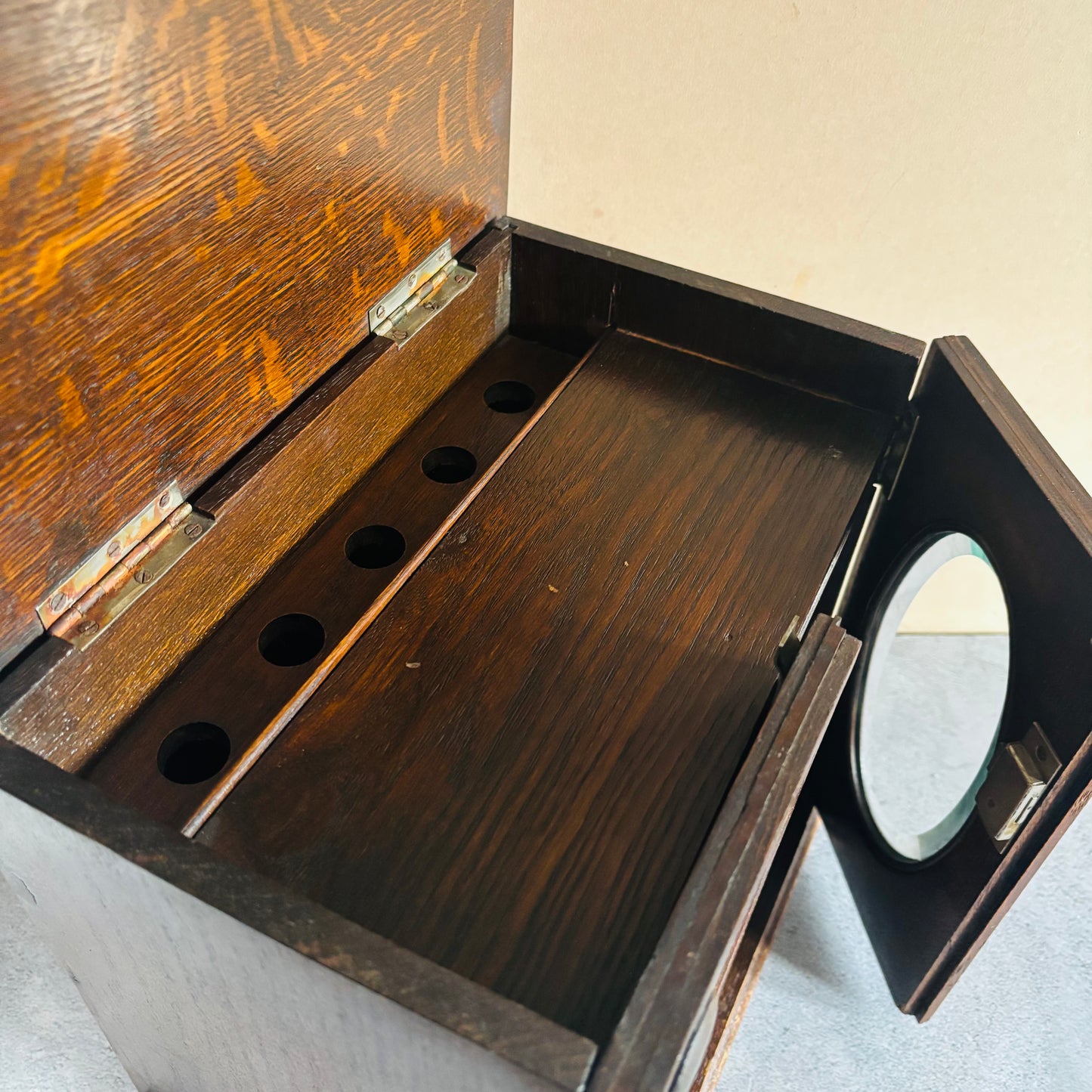 Antique Arts & Crafts Oak Smokers Pipe Cabinet For Storage Or Display with open lid showing interior compartments.