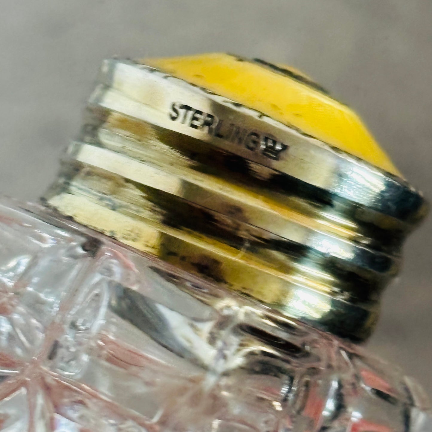 Close-up of a bottle cap with 'STERLING' branding on a glass bottle.