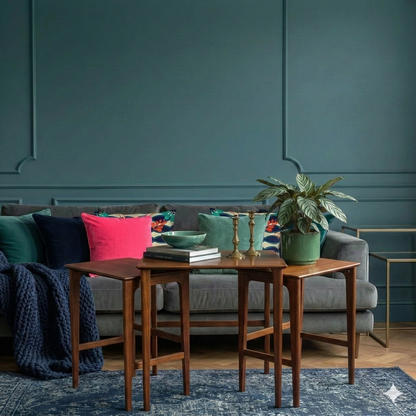 Living room with a gray sofa, colorful pillows, and wooden tables.