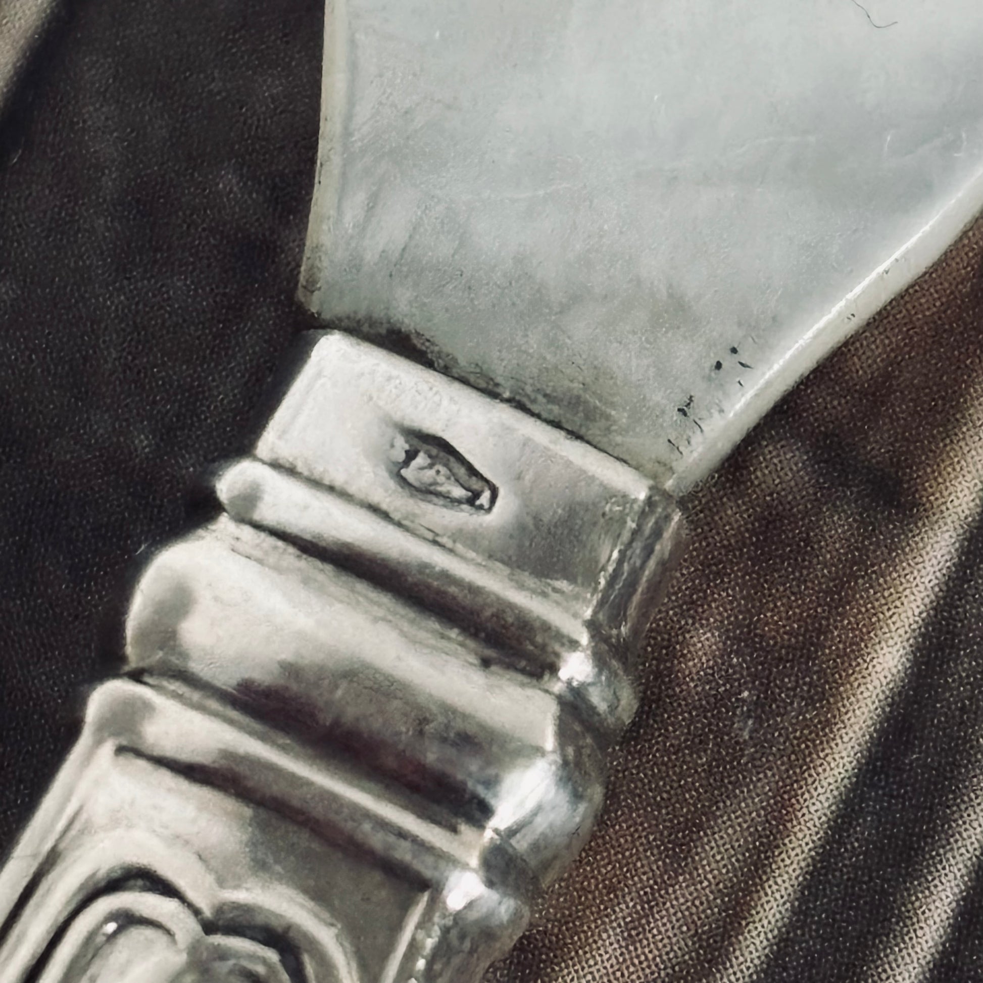 Close-up of a silver knife handle with french hallmark 