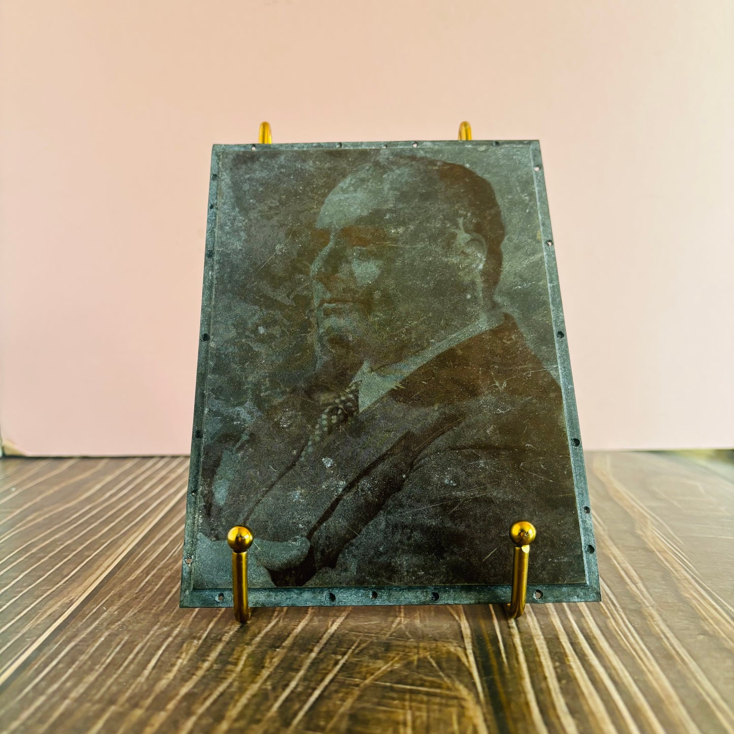 Vintage Copper Printing Plate Large Portrait of a Gentleman In A Suit  on a small stand with a pink background