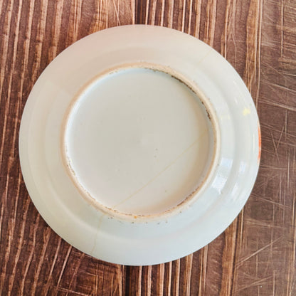 White ceramic plate on a wooden surface