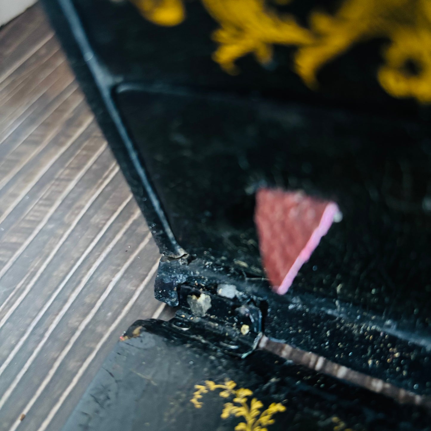 Victorian Paper Mache Lacquer Stationery Box  with hand painted floral patterns on a wooden surface