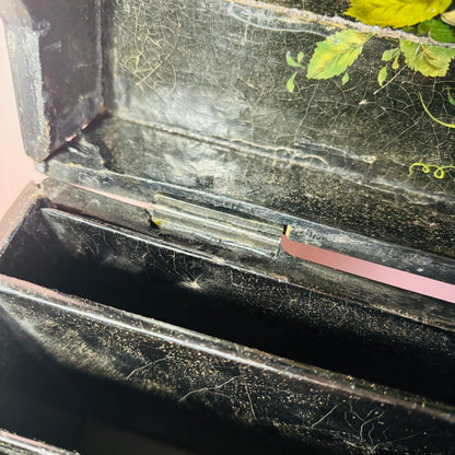 Victorian Paper Mache Lacquer Stationery Box  with hand painted floral patterns on a wooden surface
