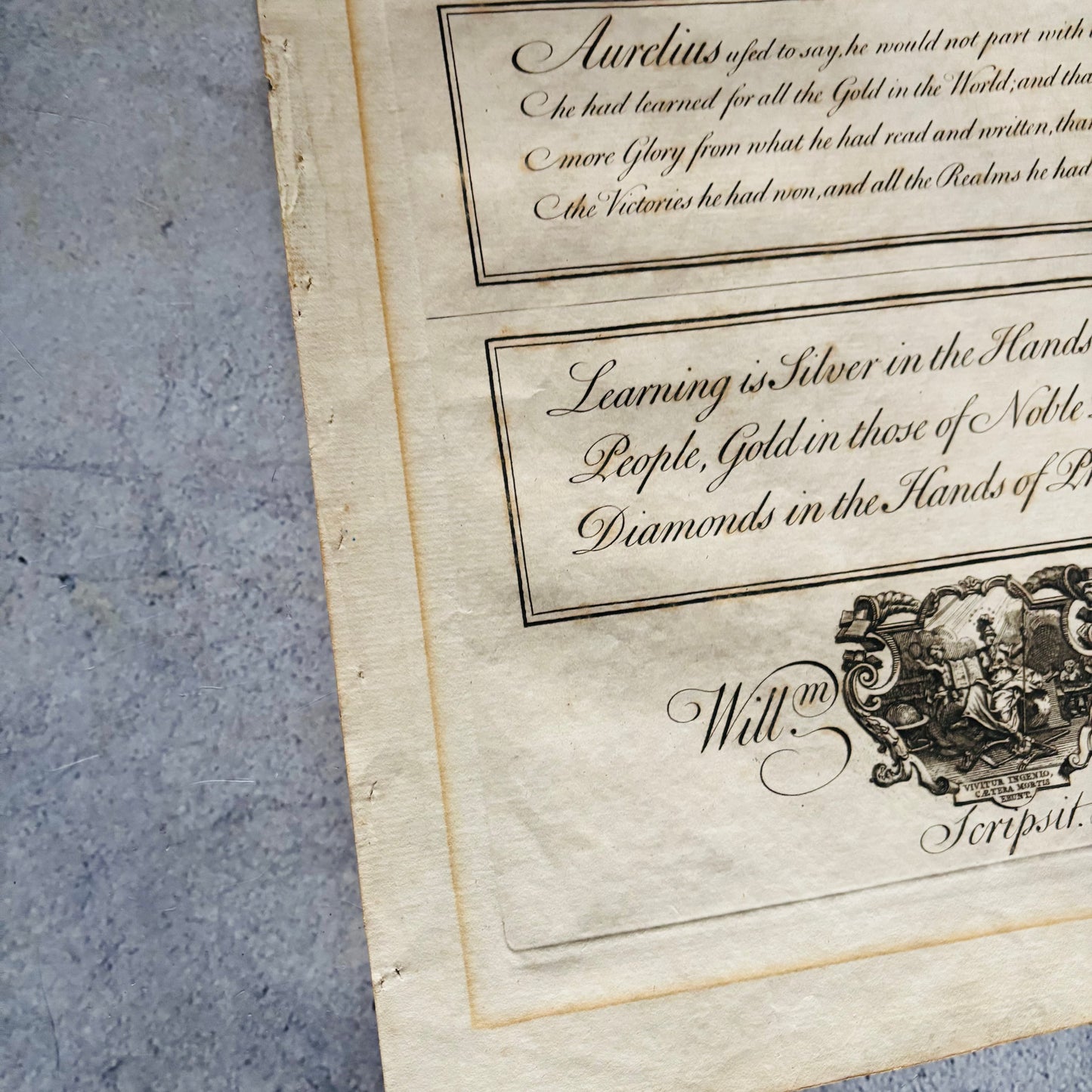 Vintage document with text and decorative elements on a textured surface