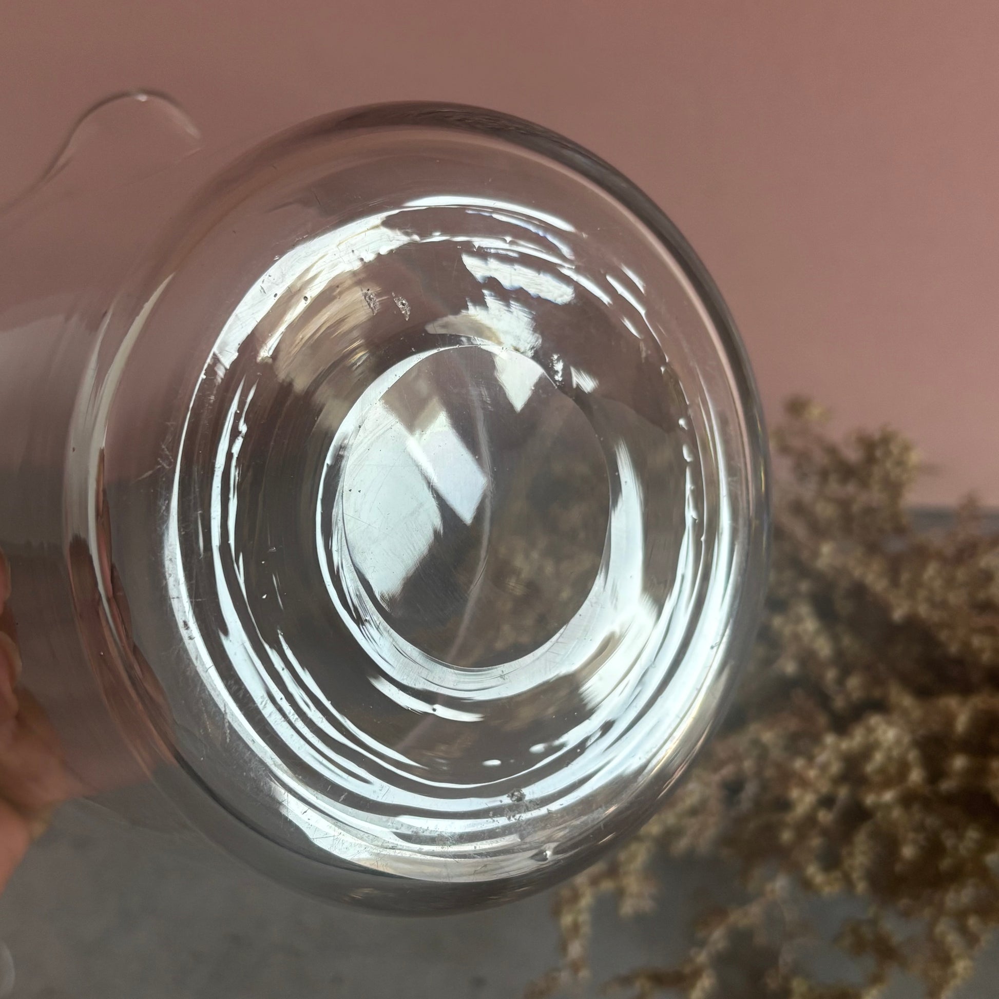 Clear glass base with a blurred background