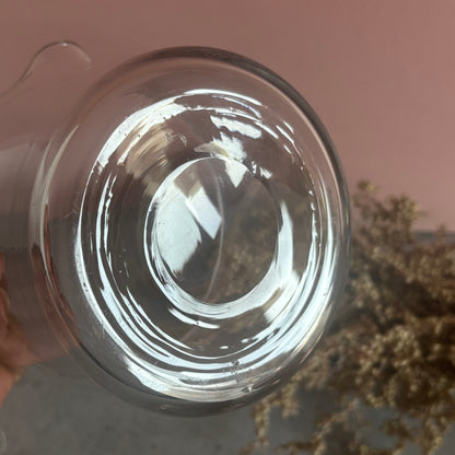 Clear glass base with a blurred background