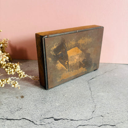 Vintage Copper Printing Plate portrait of men on a textured surface with a pink background