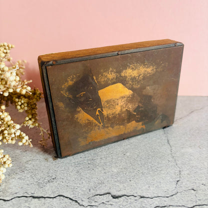 Vintage Copper Printing Plate portrait of men on a textured surface with a pink background
