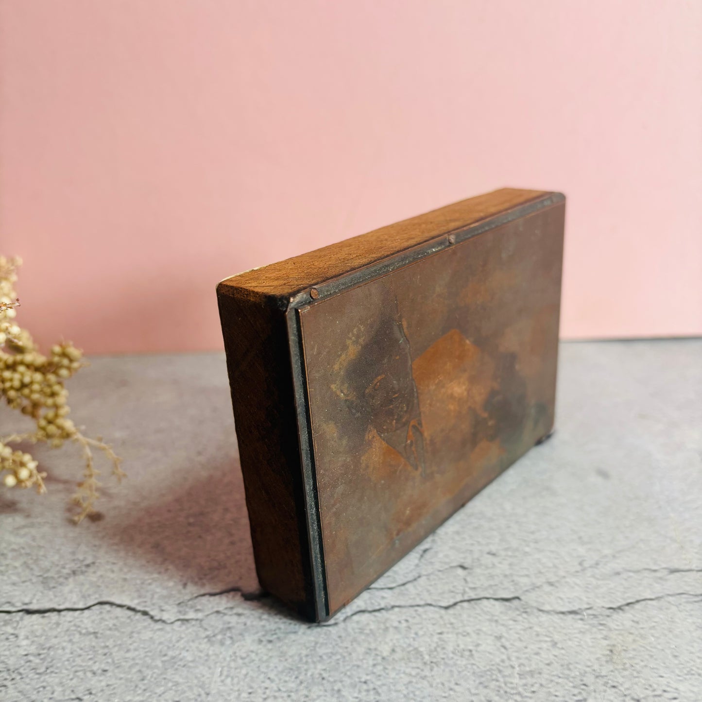 Vintage Copper Printing Plate portrait of men on a textured surface with a pink background