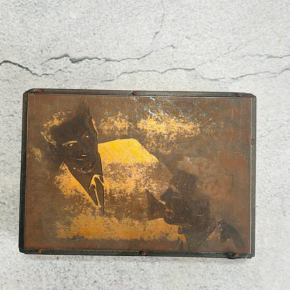Vintage Copper Printing Plate portrait of men on a textured surface
