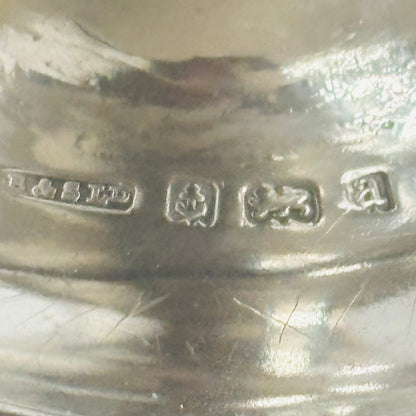 Close-up of a silver antique hallmarks