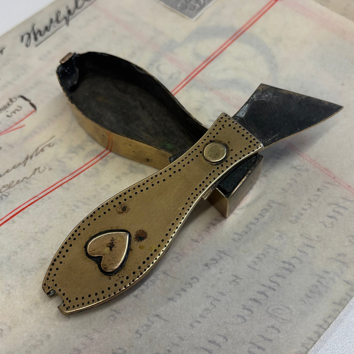 Antique Brass Dutch Coffin Puzzle Snuff Box | Rare Collectors Piece, resting on an old, handwritten letter.