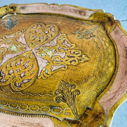 Decorative wooden tray with intricate carvings 
