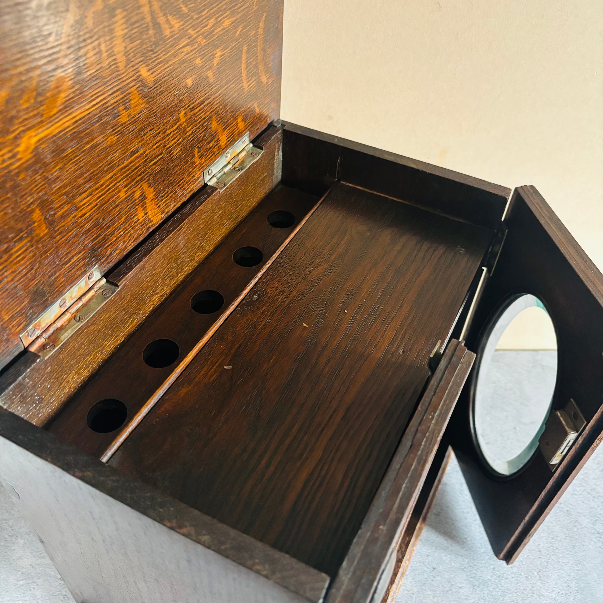 Antique Arts & Crafts Oak Smokers Pipe Cabinet For Storage Or Display with open lid showing interior compartments.