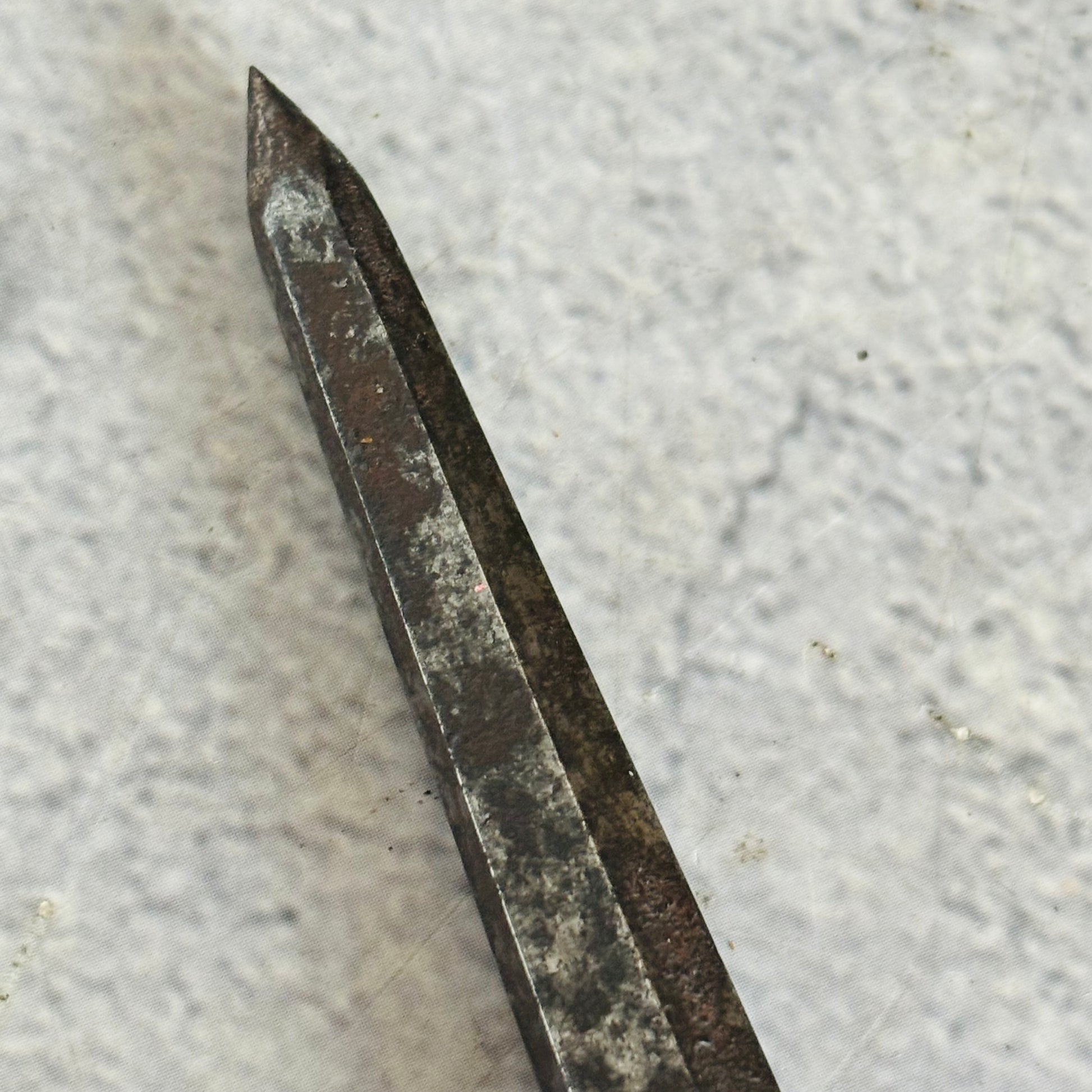 Close-up of an Antique Steel Skewer 