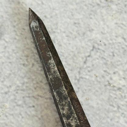 Close-up of an Antique Steel Skewer 