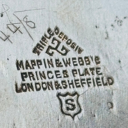 Mappin & Webb's Princes Plate stamp on a metallic surface