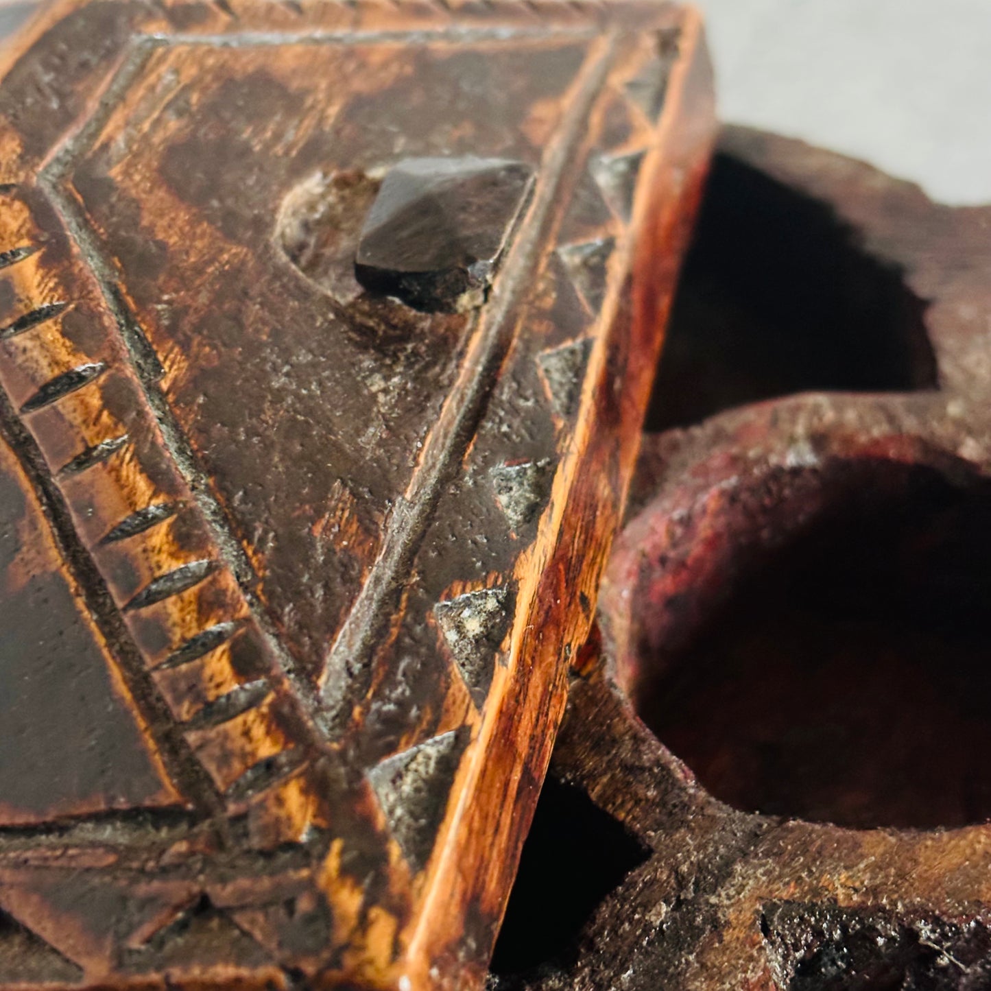 Close-up of a textured brown Antique Indian Wooden Spice Box Swivel Lid | The Urban Vintage Affair