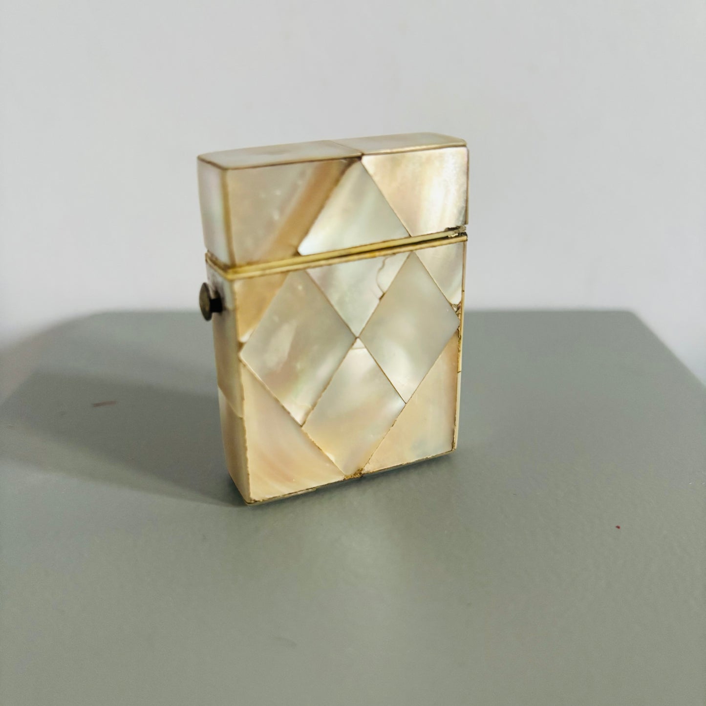 Decorative Rare Antique Mother Of Pearl Vesta  on a grey surface with a white background