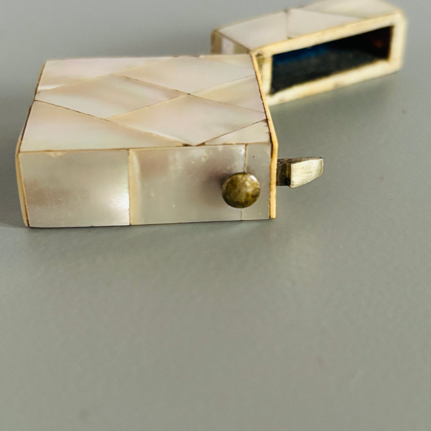 Decorative Rare Antique Mother Of Pearl Vesta  on a grey surface with a white background