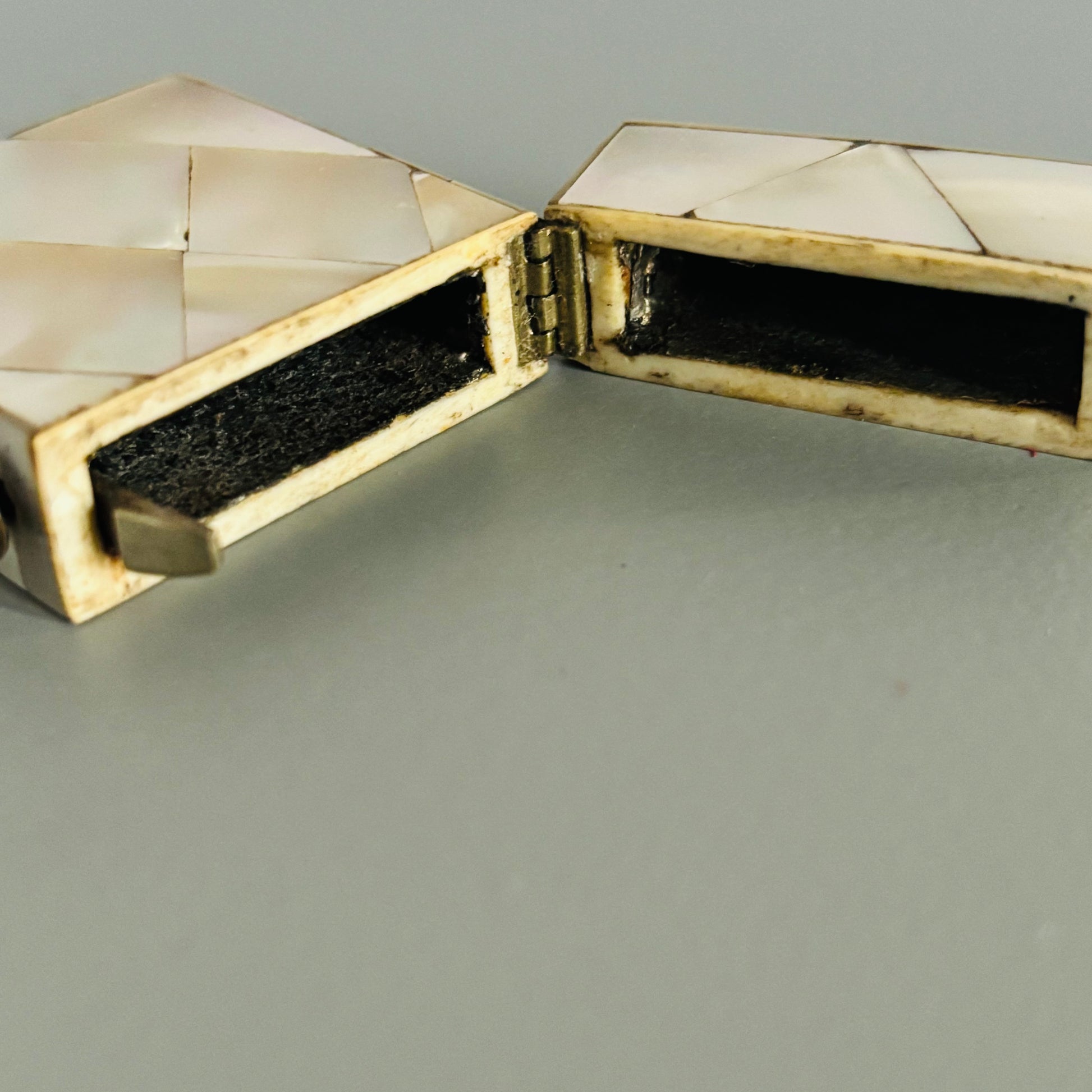 Decorative Rare Antique Mother Of Pearl Vesta  on a grey surface with a white background