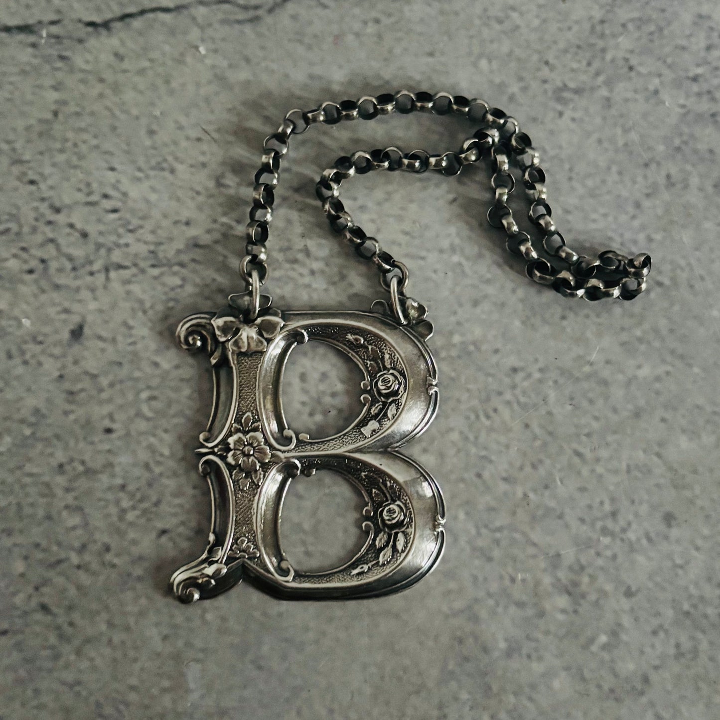 The Director Kasey - Antique Silver Letter Decanter Label