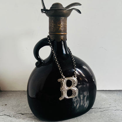 The Director Kasey - Antique Silver Letter Decanter Label