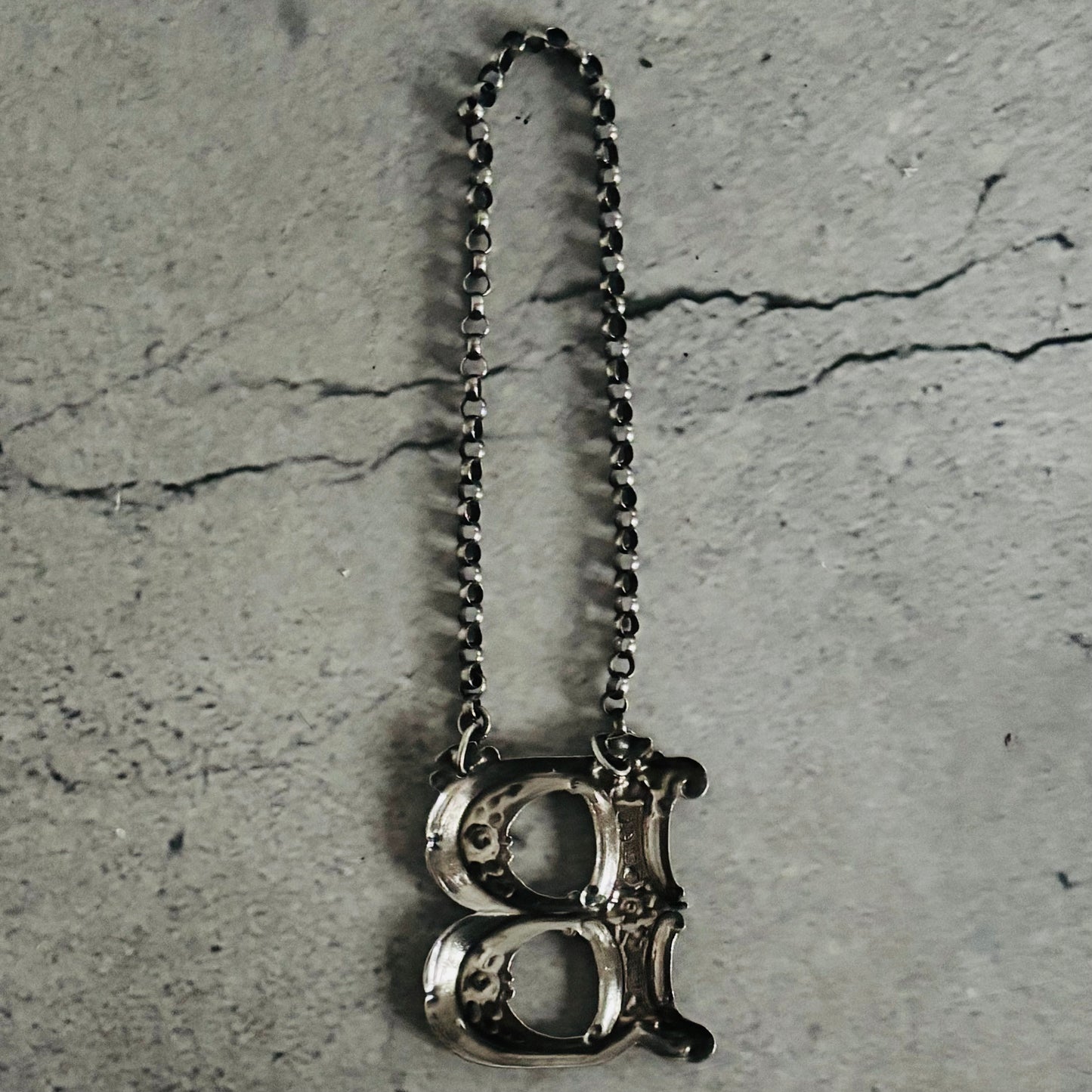 The Director Kasey - Antique Silver Letter Decanter Label