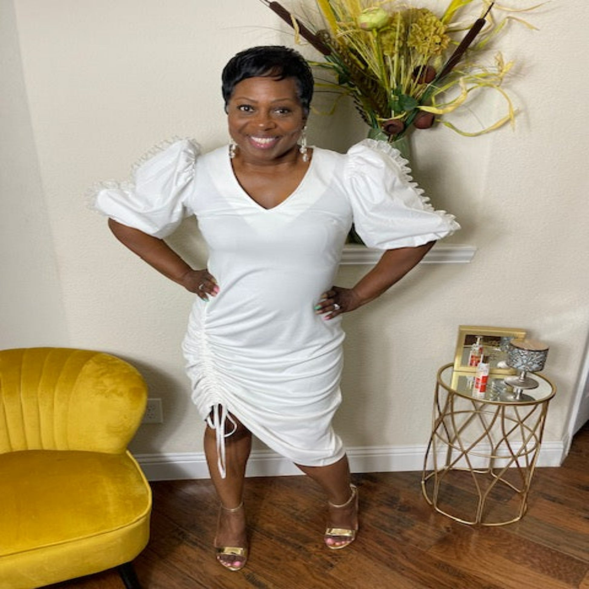 Silver Chainmail Pouch Bag with tassel on a pink background