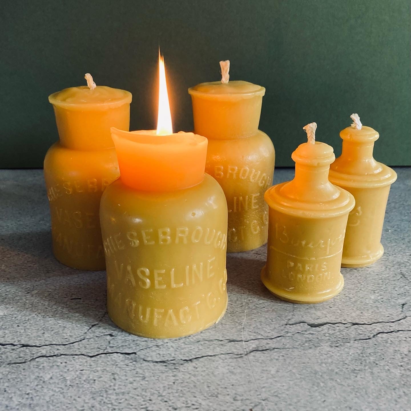 Handmade Beeswax Candles in Antique Bottle Designs