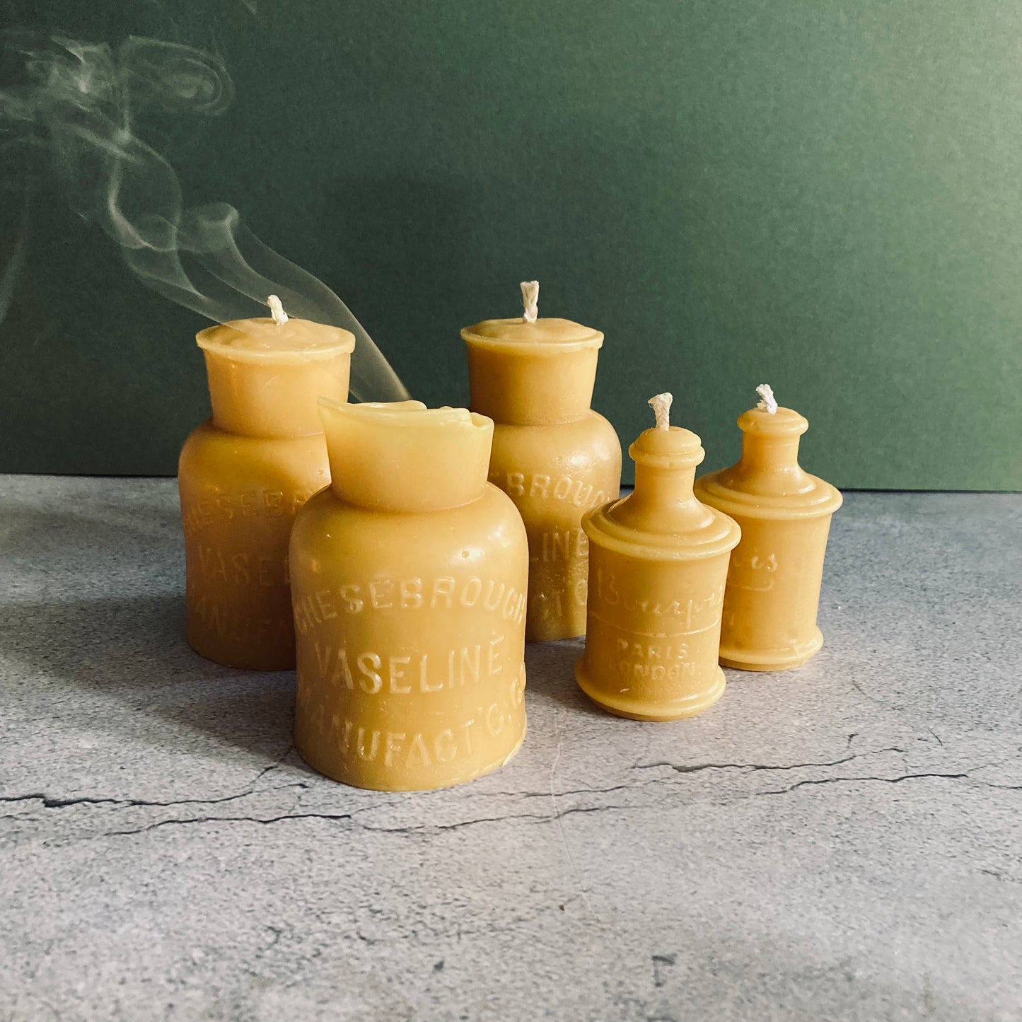 Handmade Beeswax Candles in Antique Bottle Designs