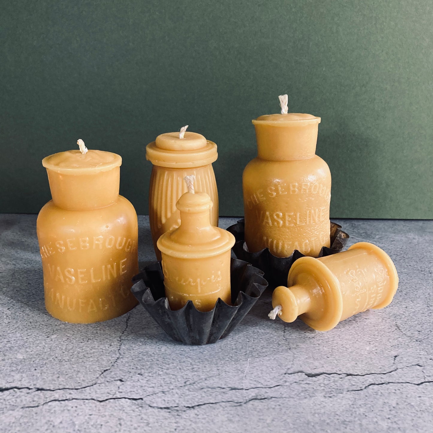 Handmade Beeswax Candles in Antique Bottle Designs